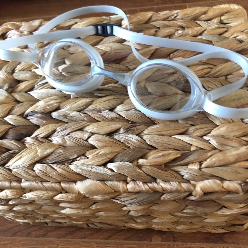 White and clear swim goggles